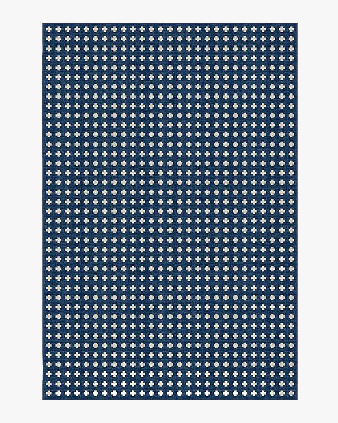Navy rug with small white crosses in pattern.