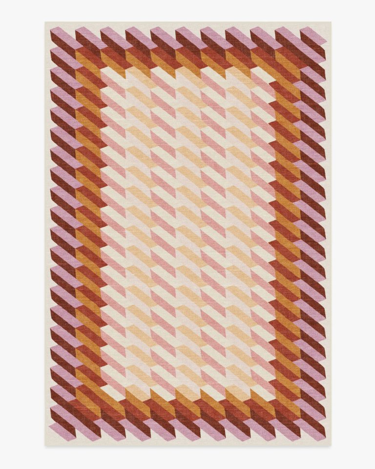Orange and pink geometric pattern rug.