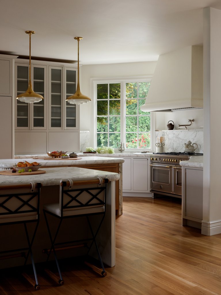 white kitchen with marble details
