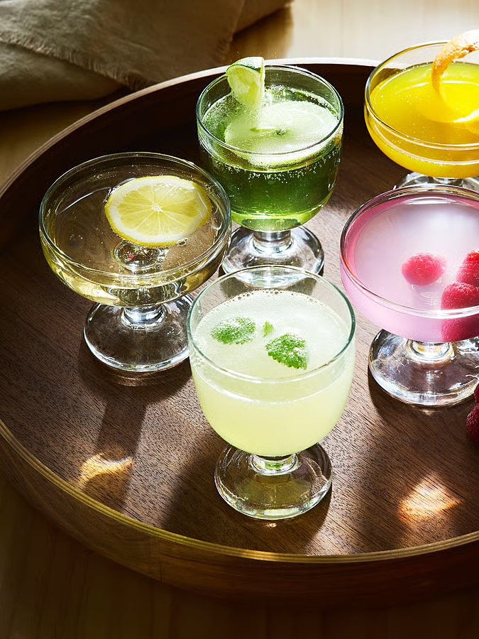 tray of cocktails in goblets