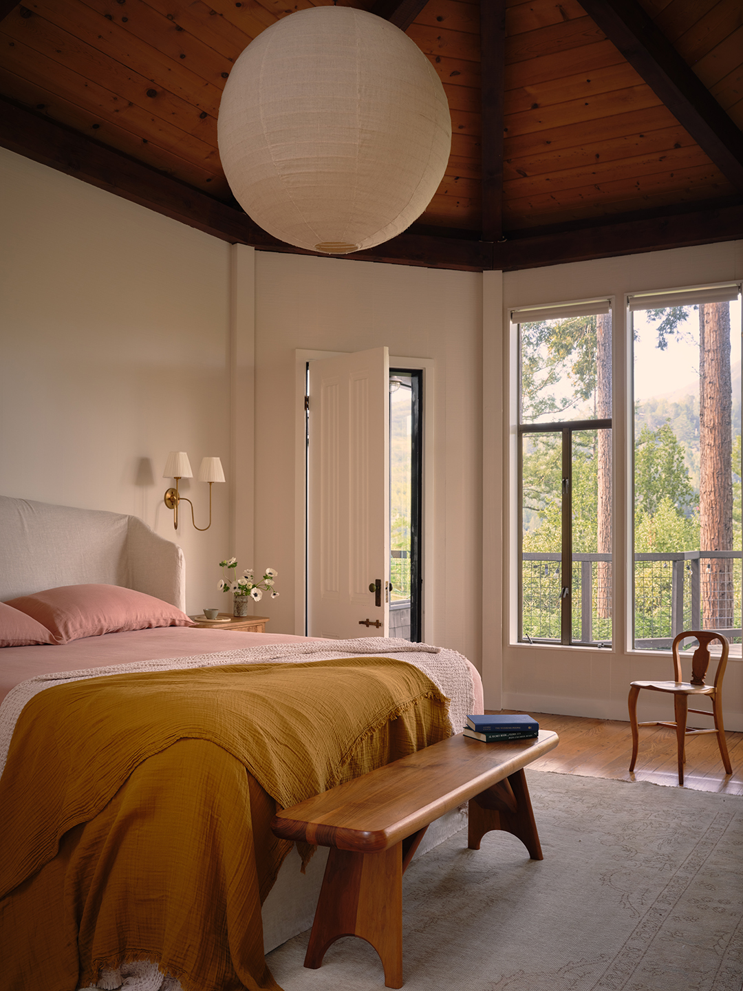 bedroom with large paper lantern