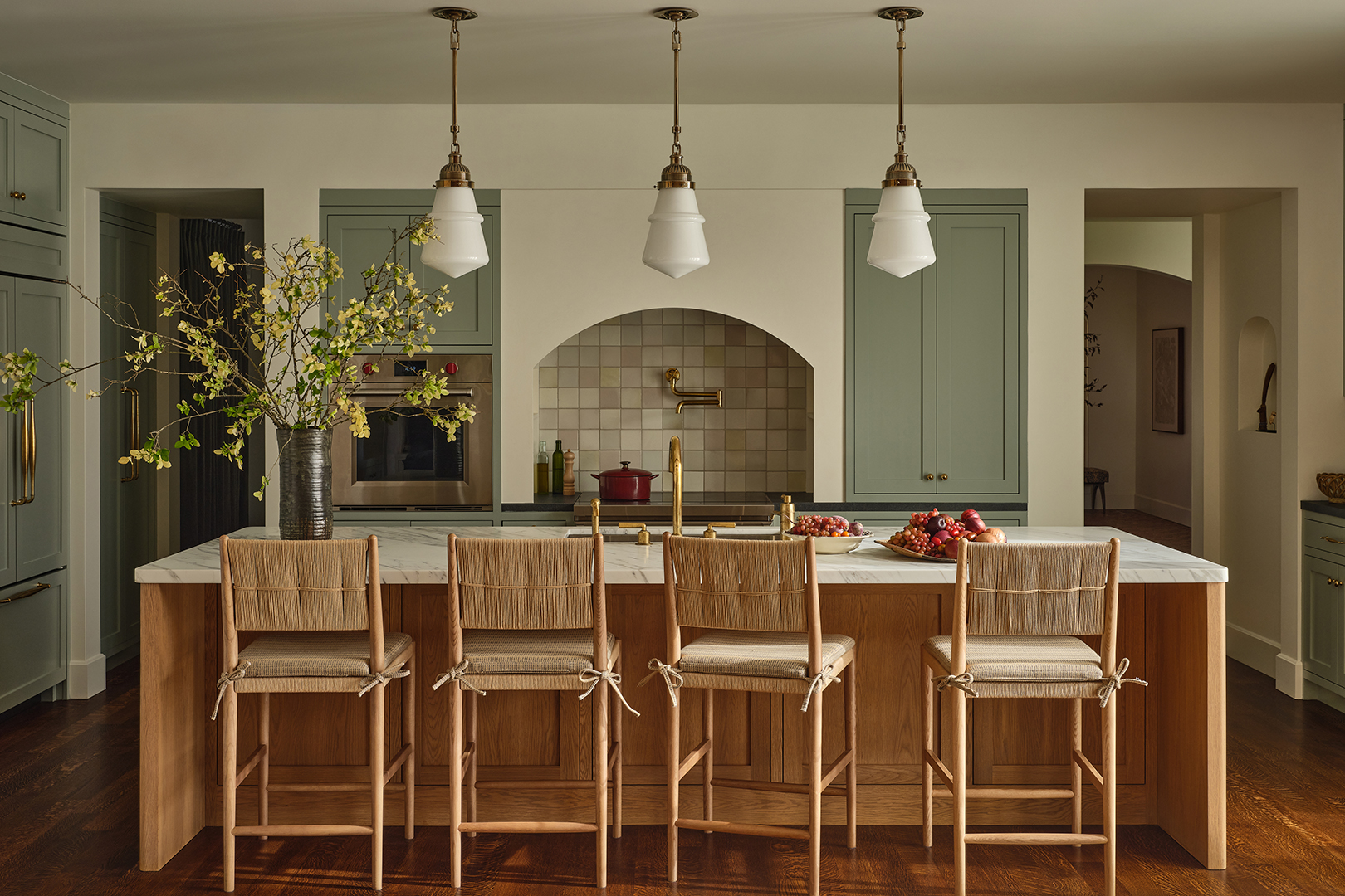 kitchen with large island and hanging pendants