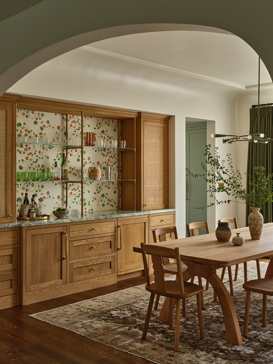 dining room with arched entryway