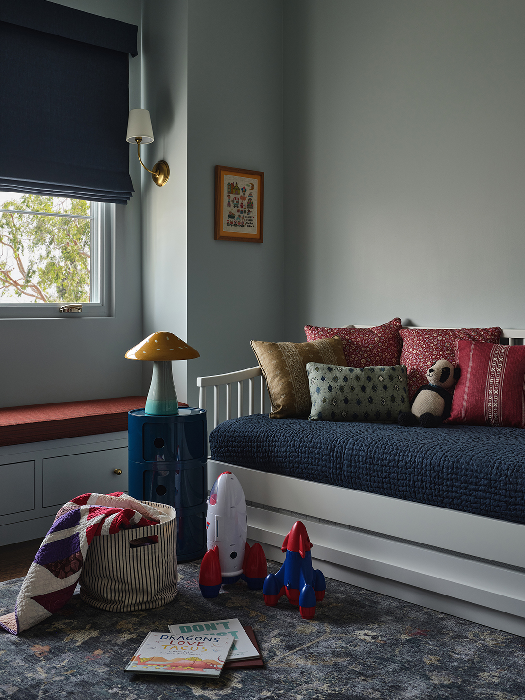 kids room with daybed and toys