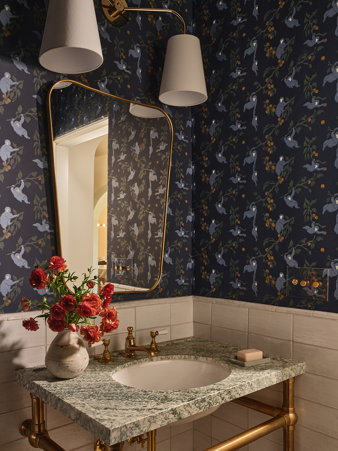 powder room with monkey wallpaper