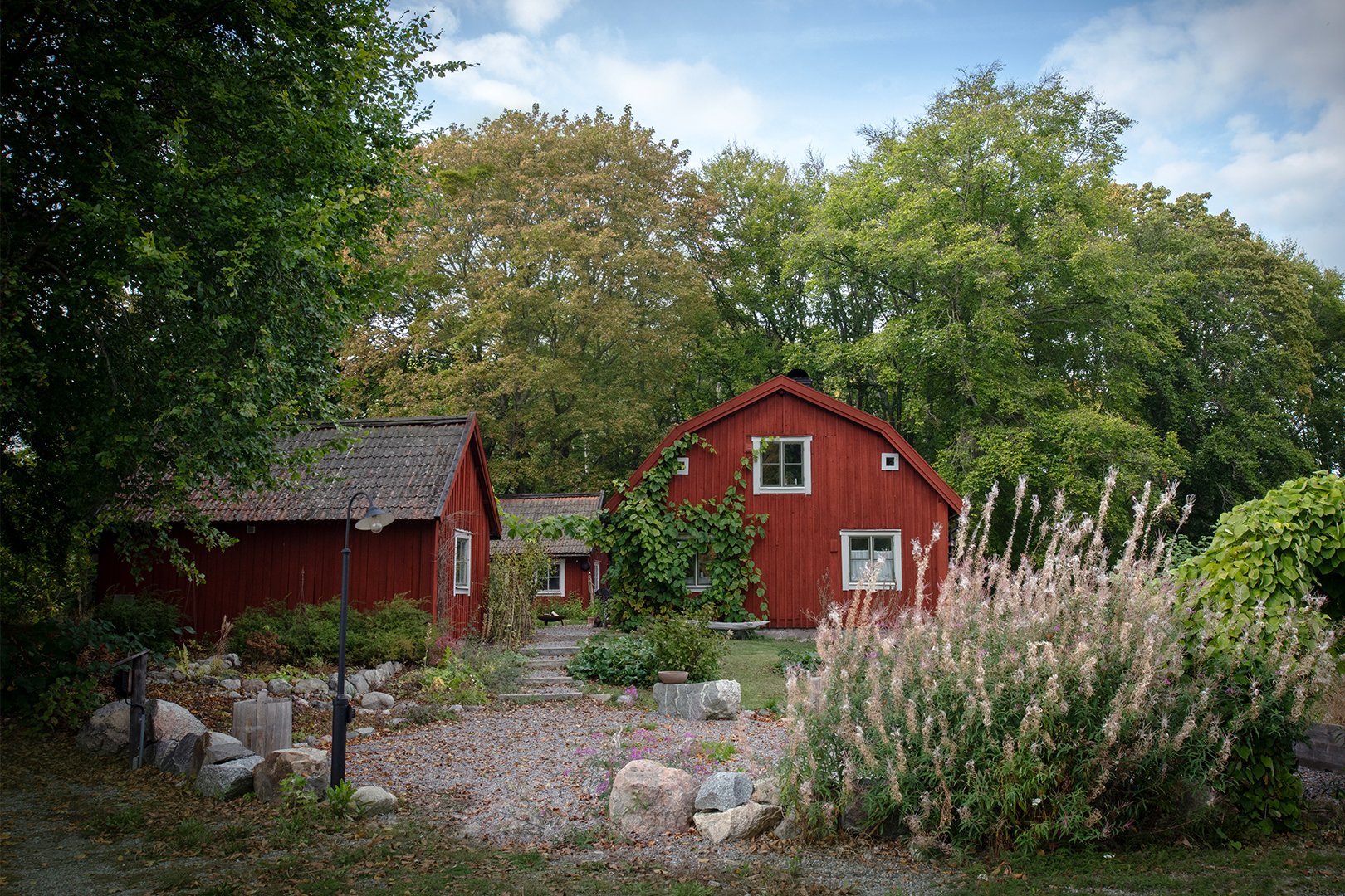 red cottage in countryside
