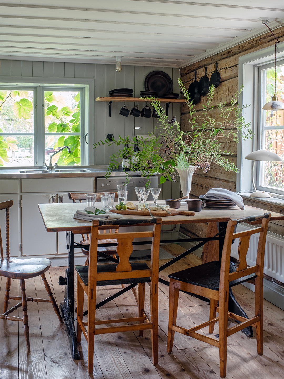 kitchen with small dining table and set of chairs
