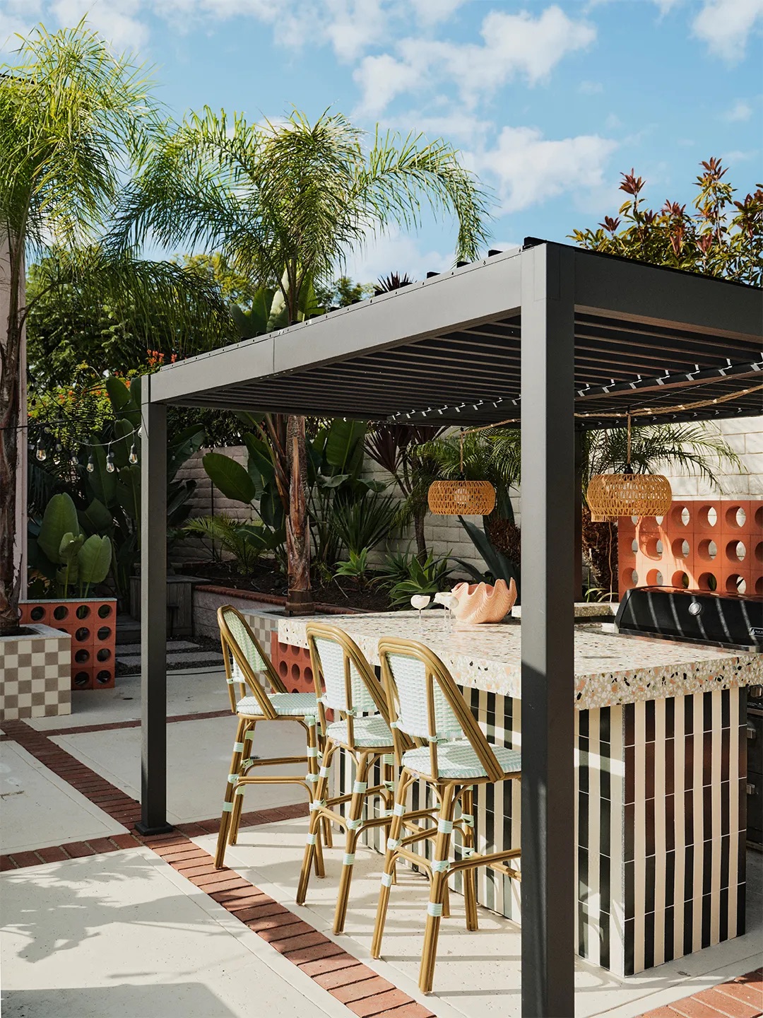 outdoor area with pergola and terrazzo bar