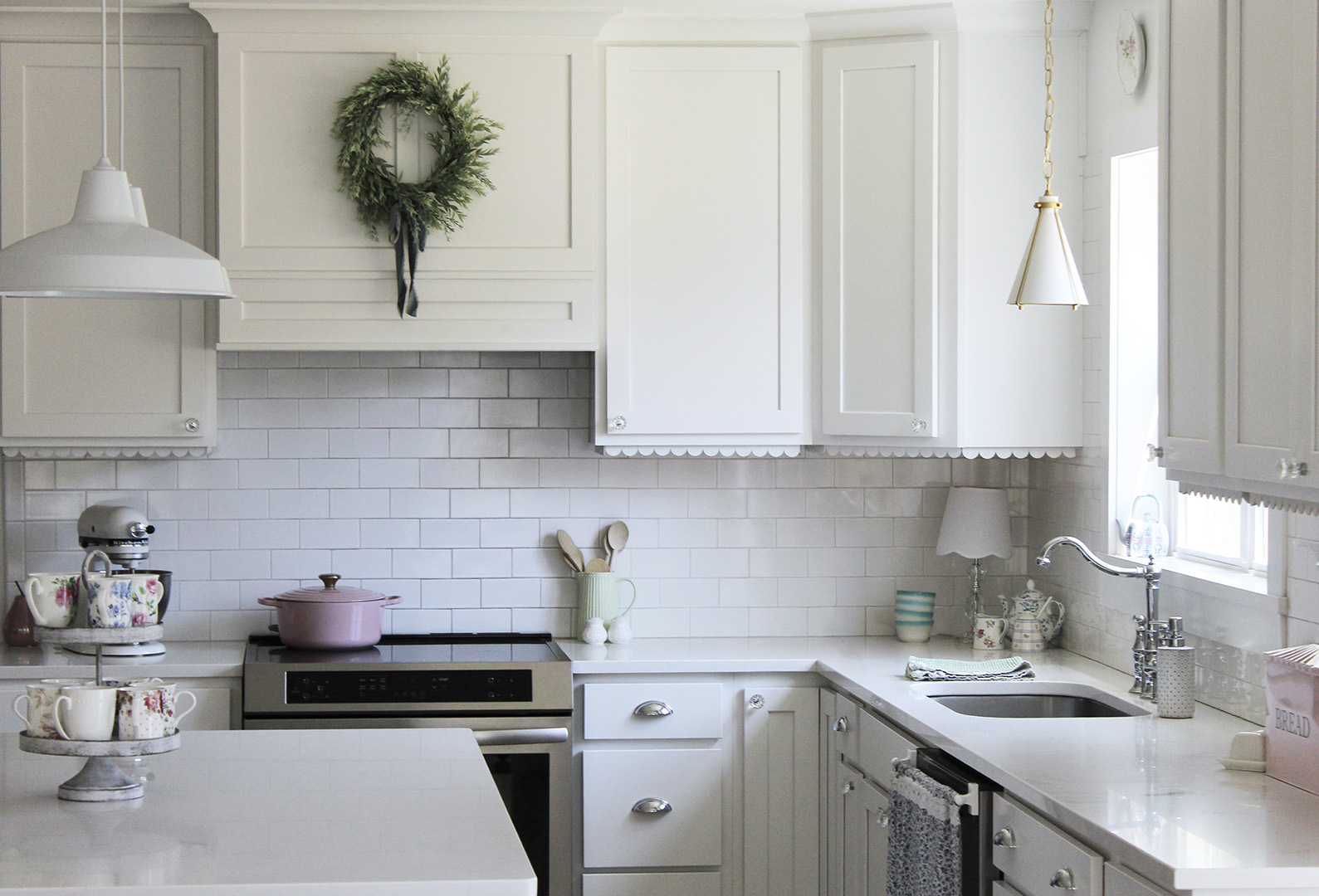 white cabinets with scallop trim