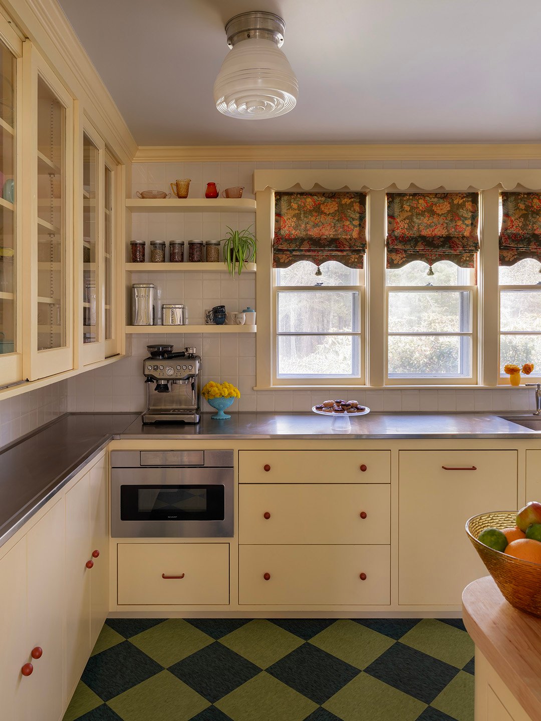 yellow kitchen with checkered floors