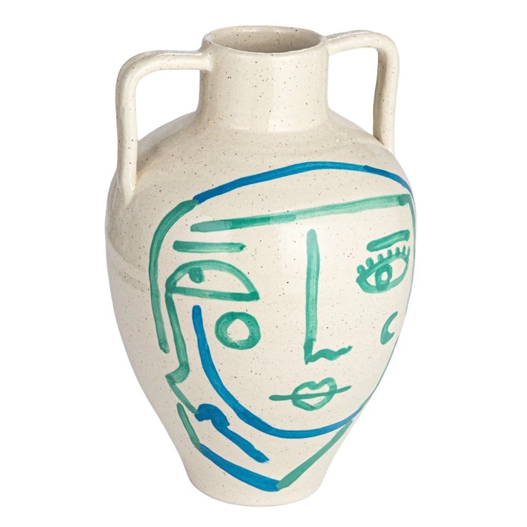 white handled vase with painted face motif
