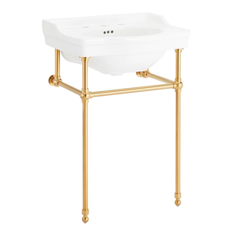 white washstand sink with brass legs