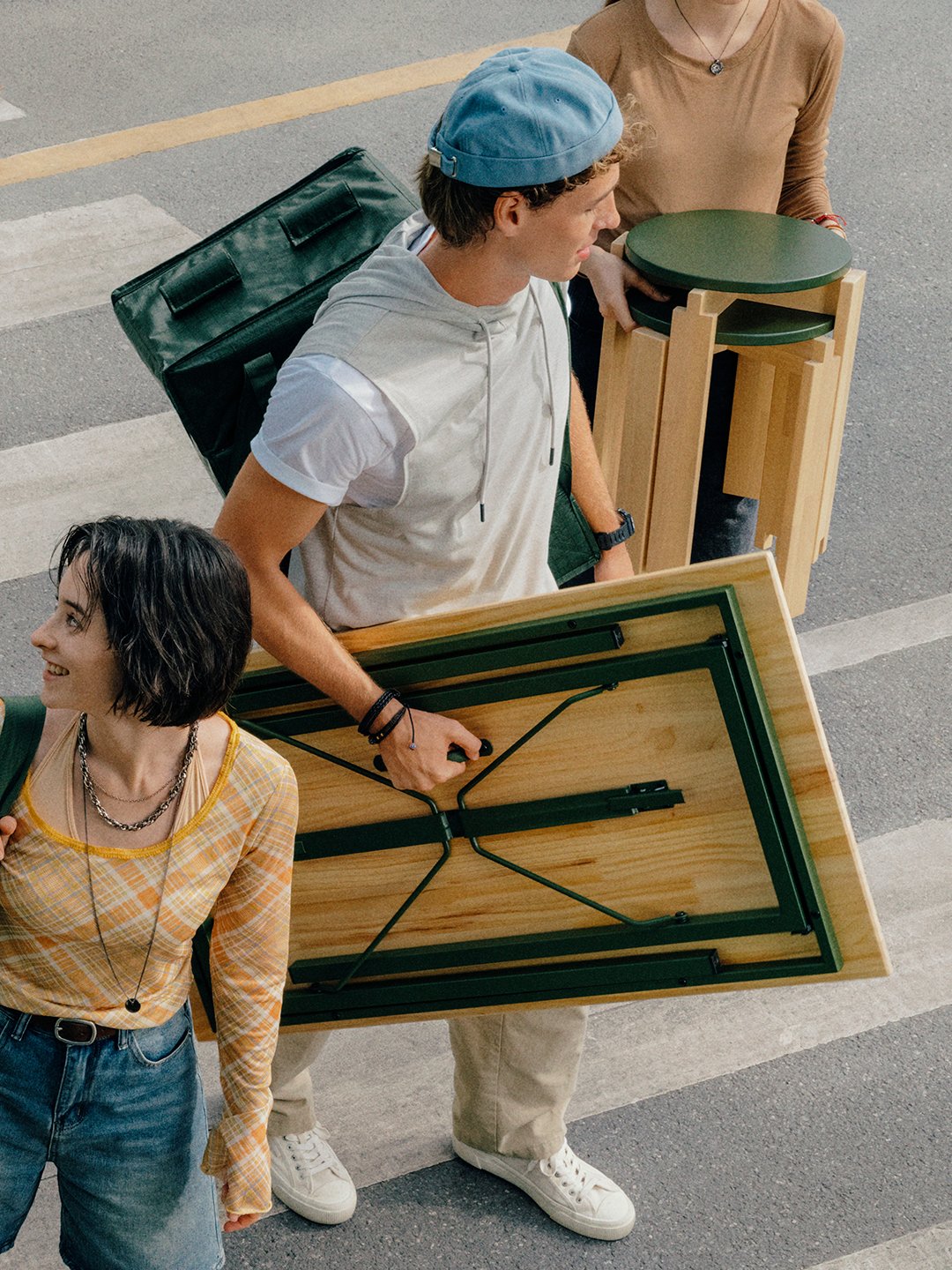 person carrying a table