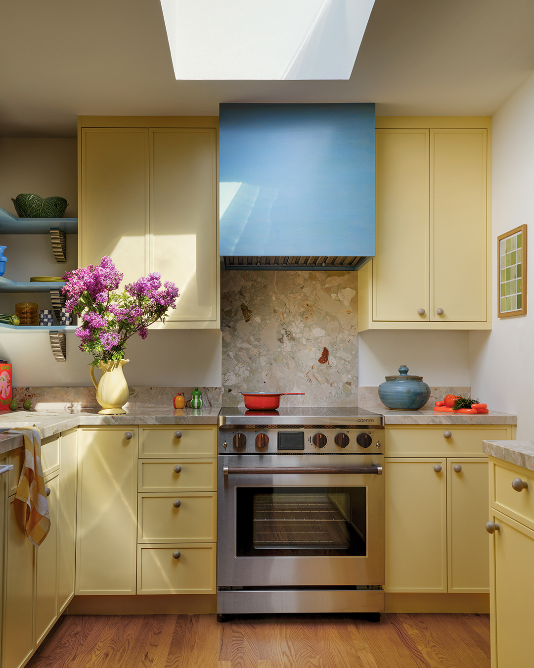 yellow kitchen with blue hood