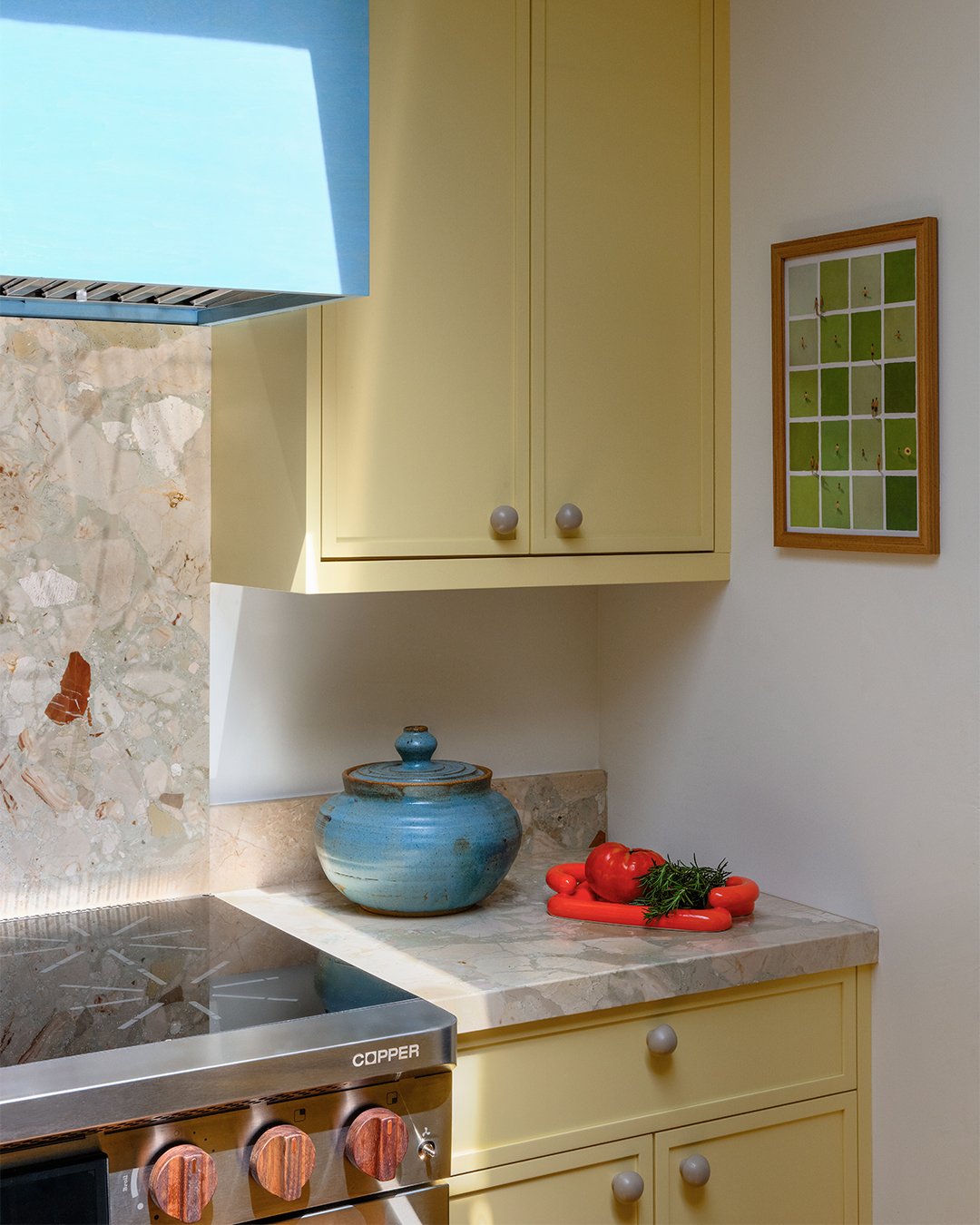 yellow kitchen with blue hood