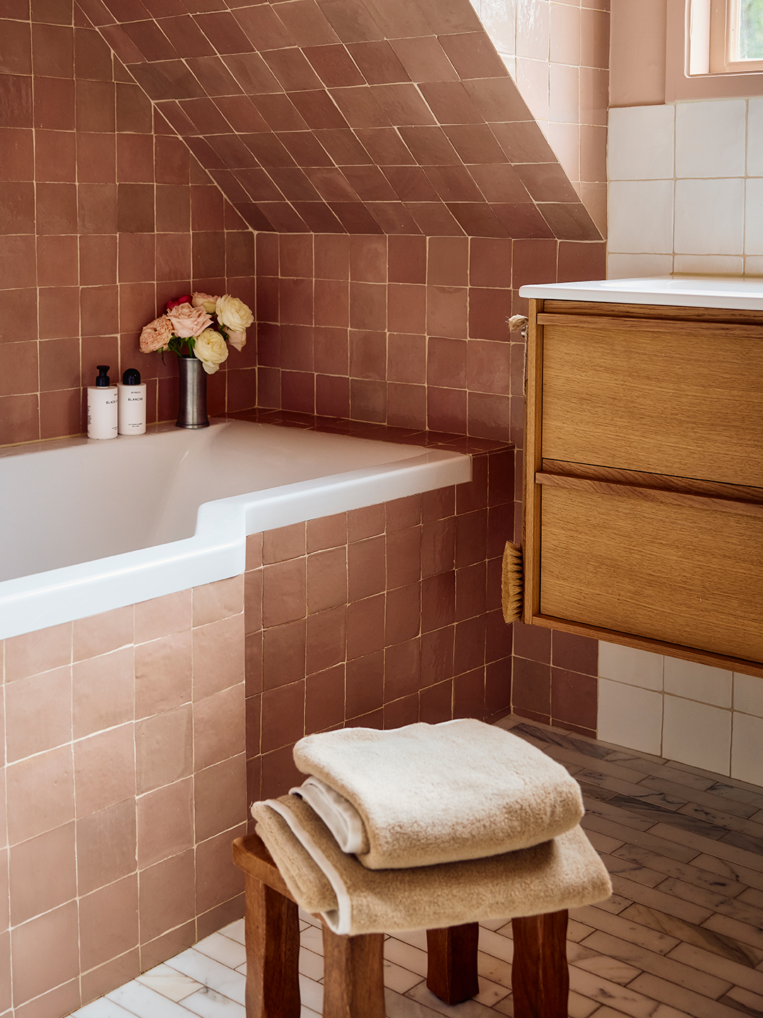 pink bathroom with footstool