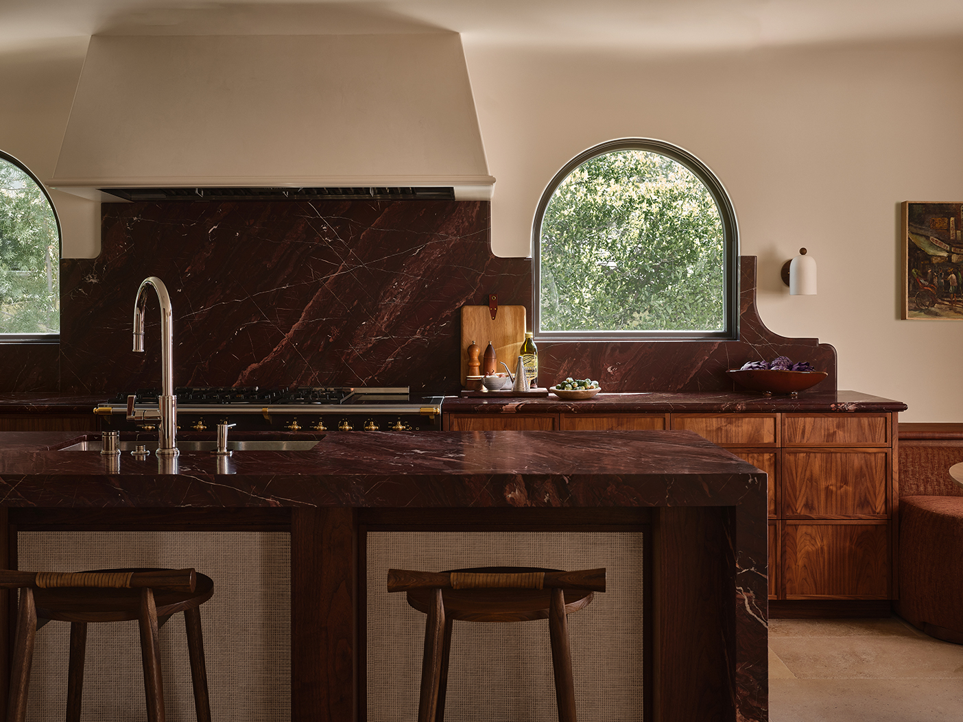 kitchen with marble island and backsplash