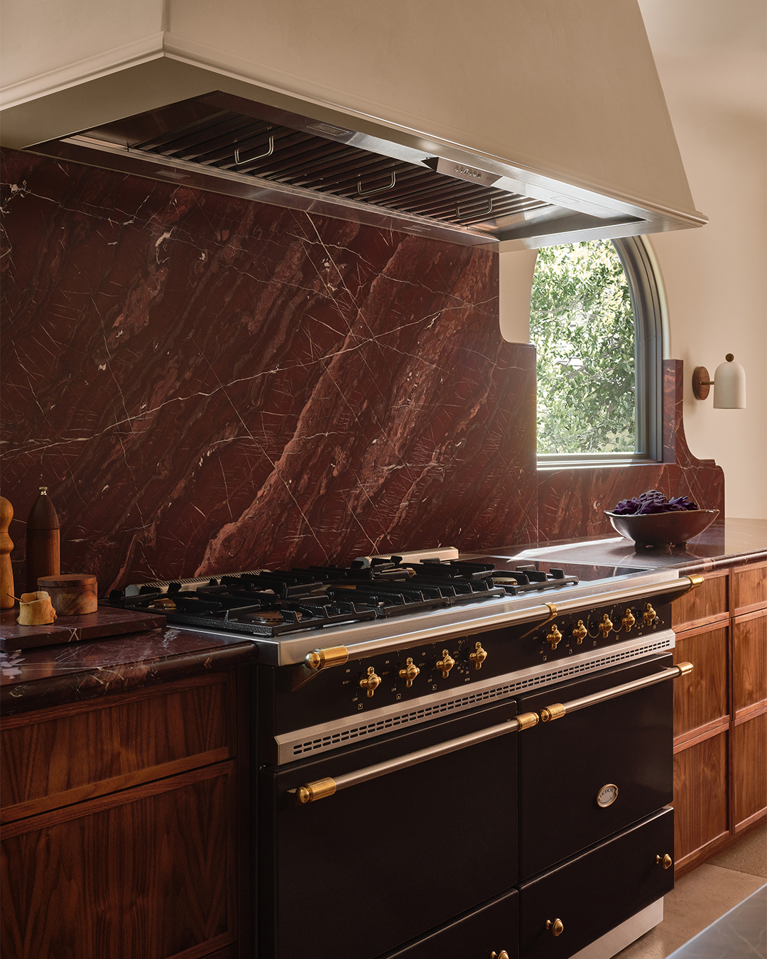 range and marble backsplash