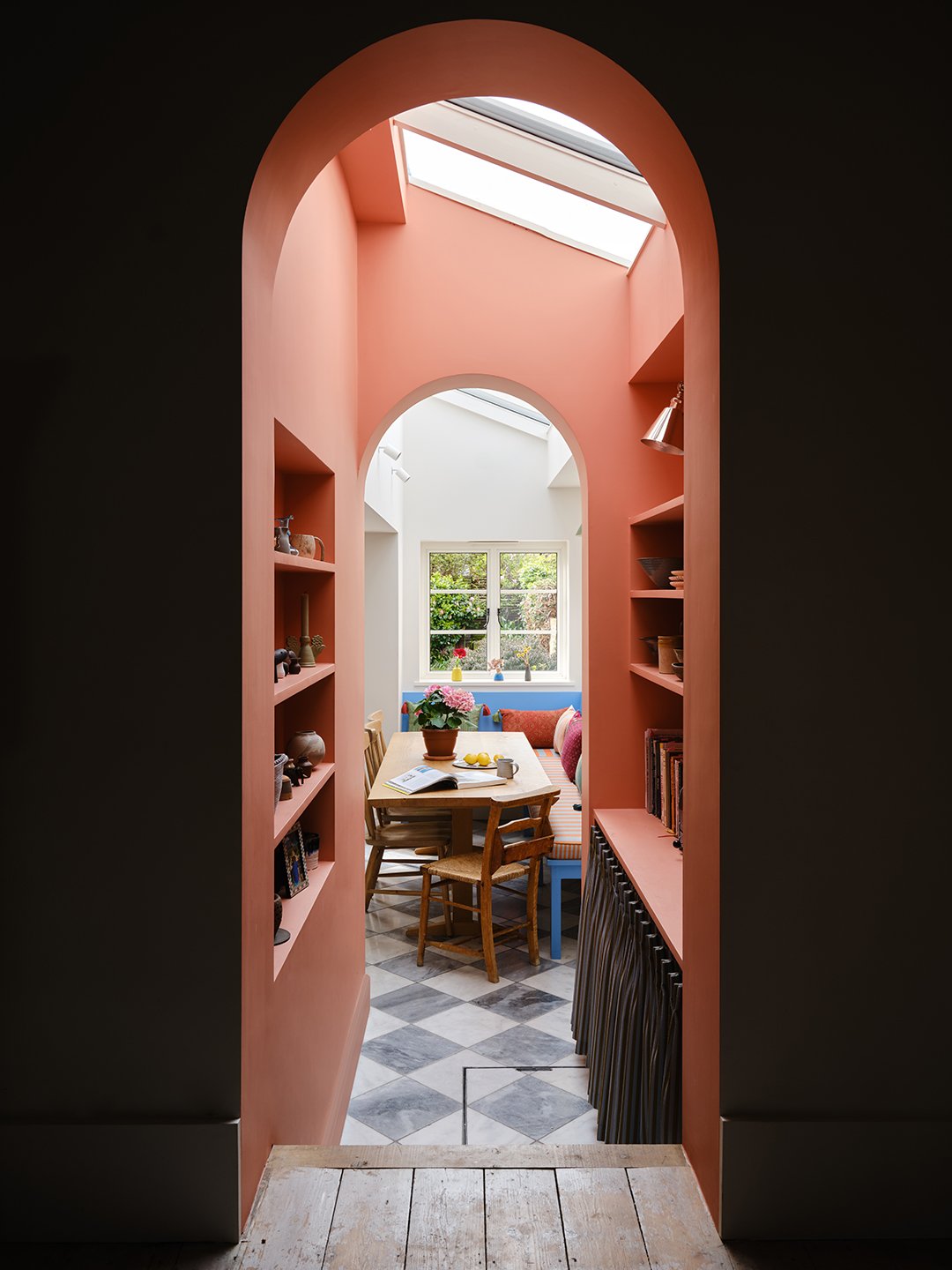 arched pantry entrance into kitchen