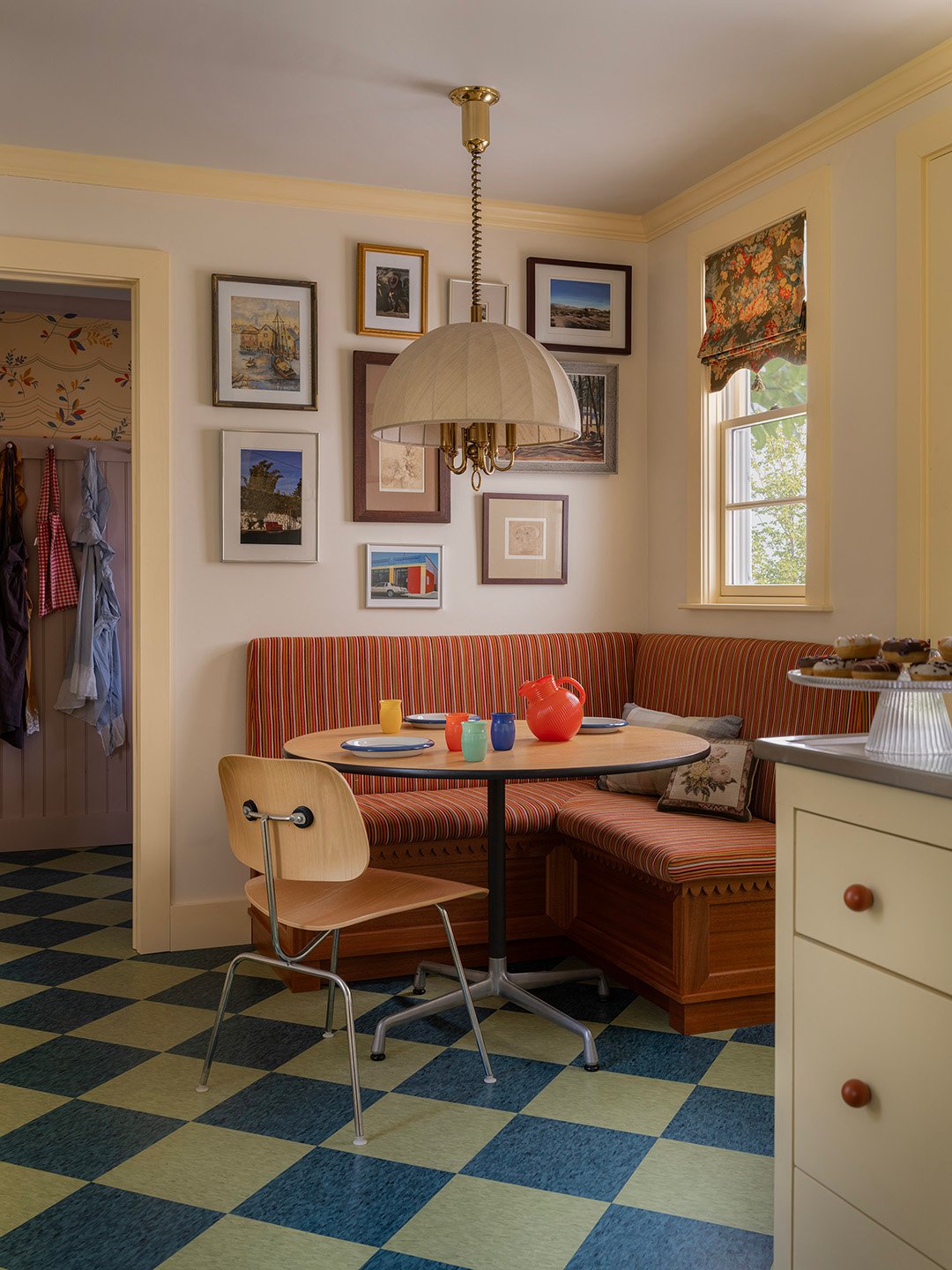 breakfast nook with striped banquette