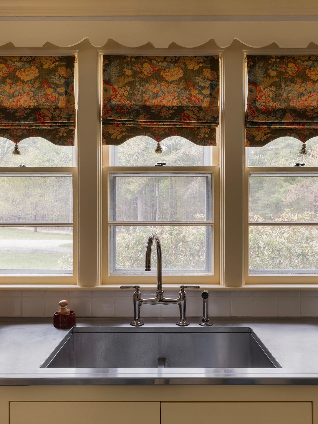 yellow kitchen with sink view