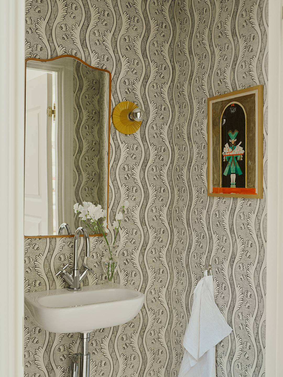 powder room with wallpaper