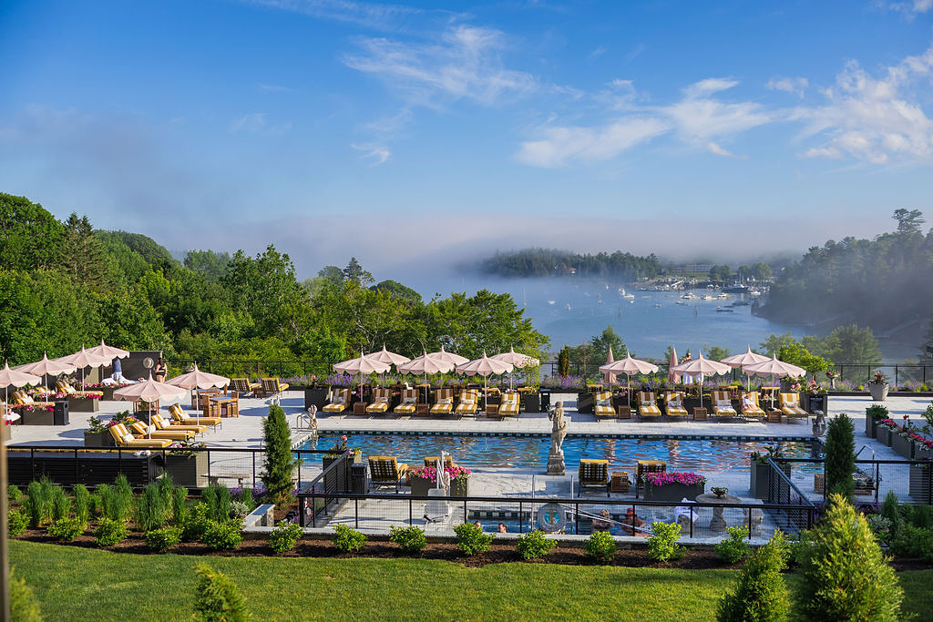 view of pool and foggy harbor