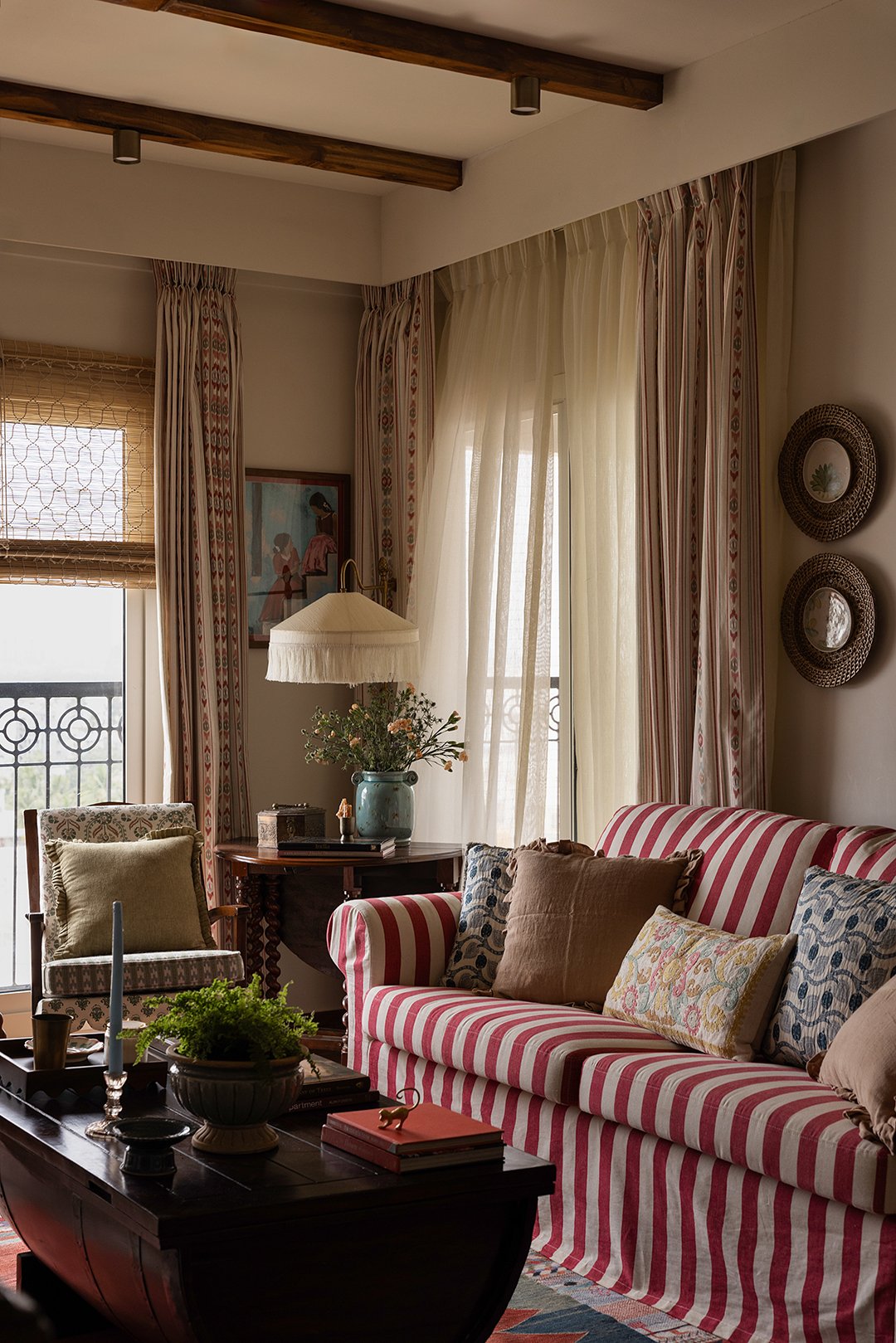 living room with striped sofa