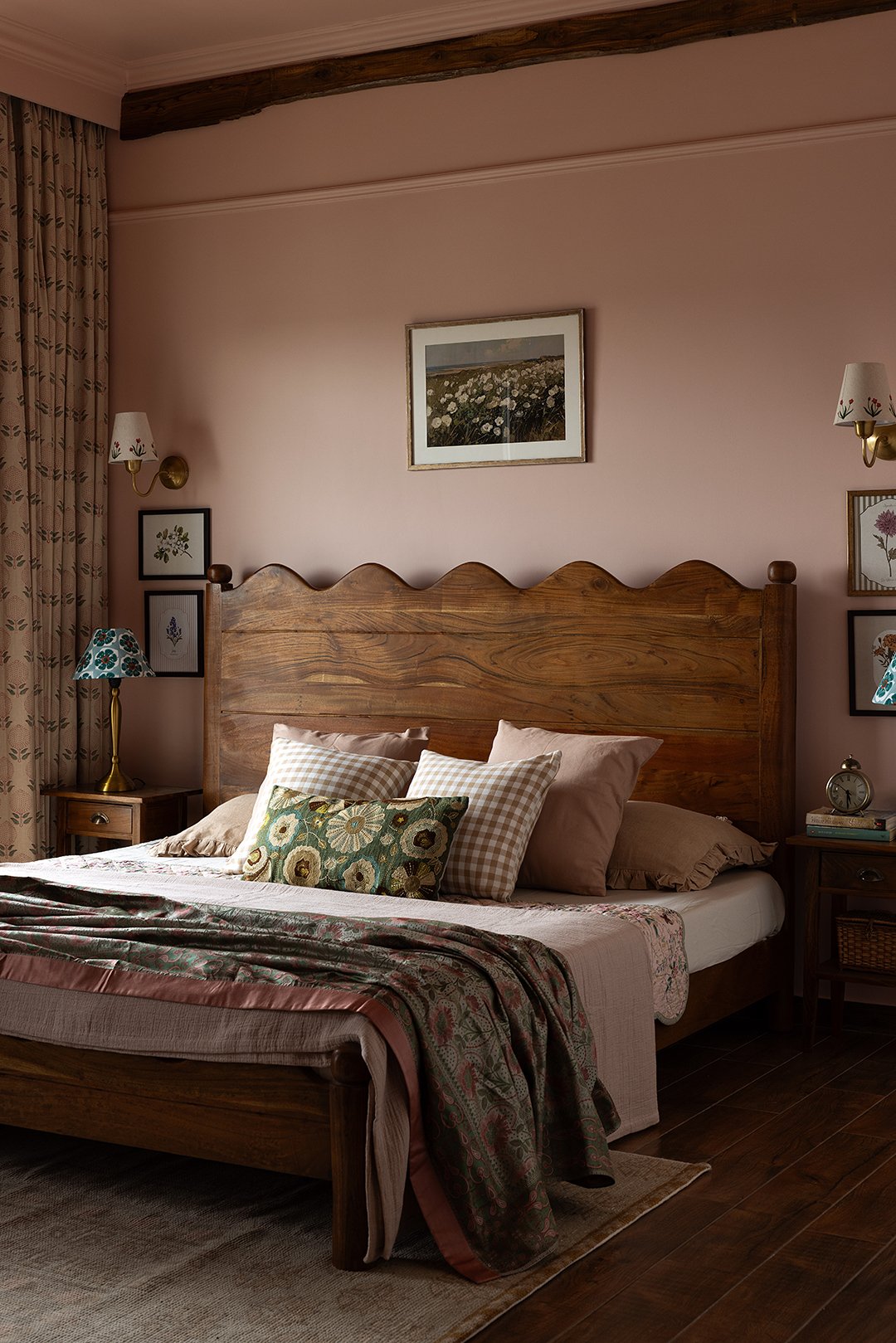 pink bedroom with wood headboard