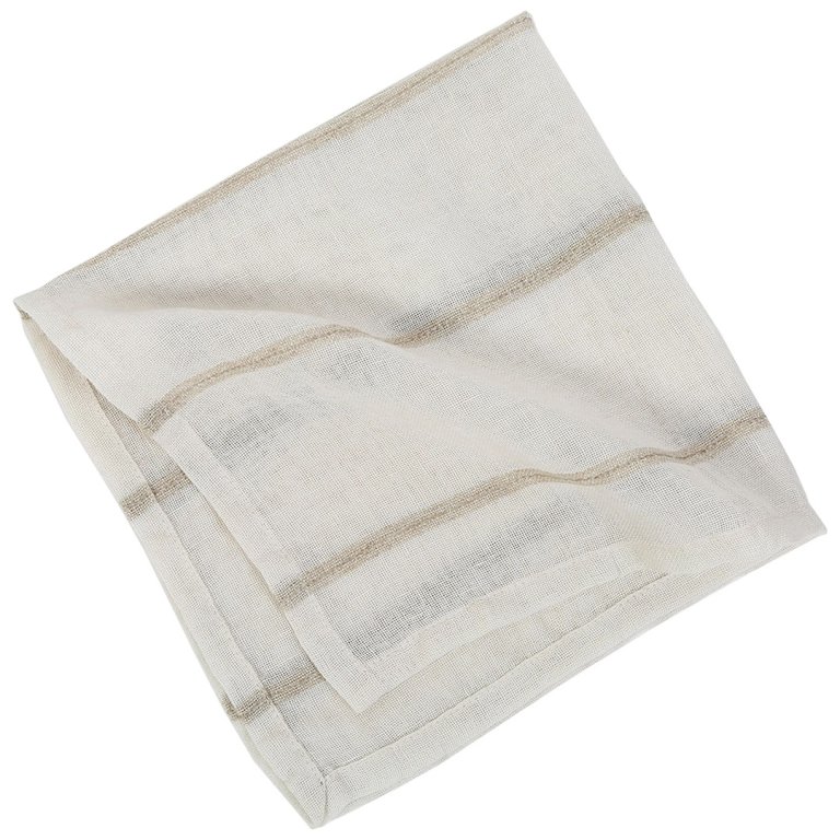 white and beige striped napkin