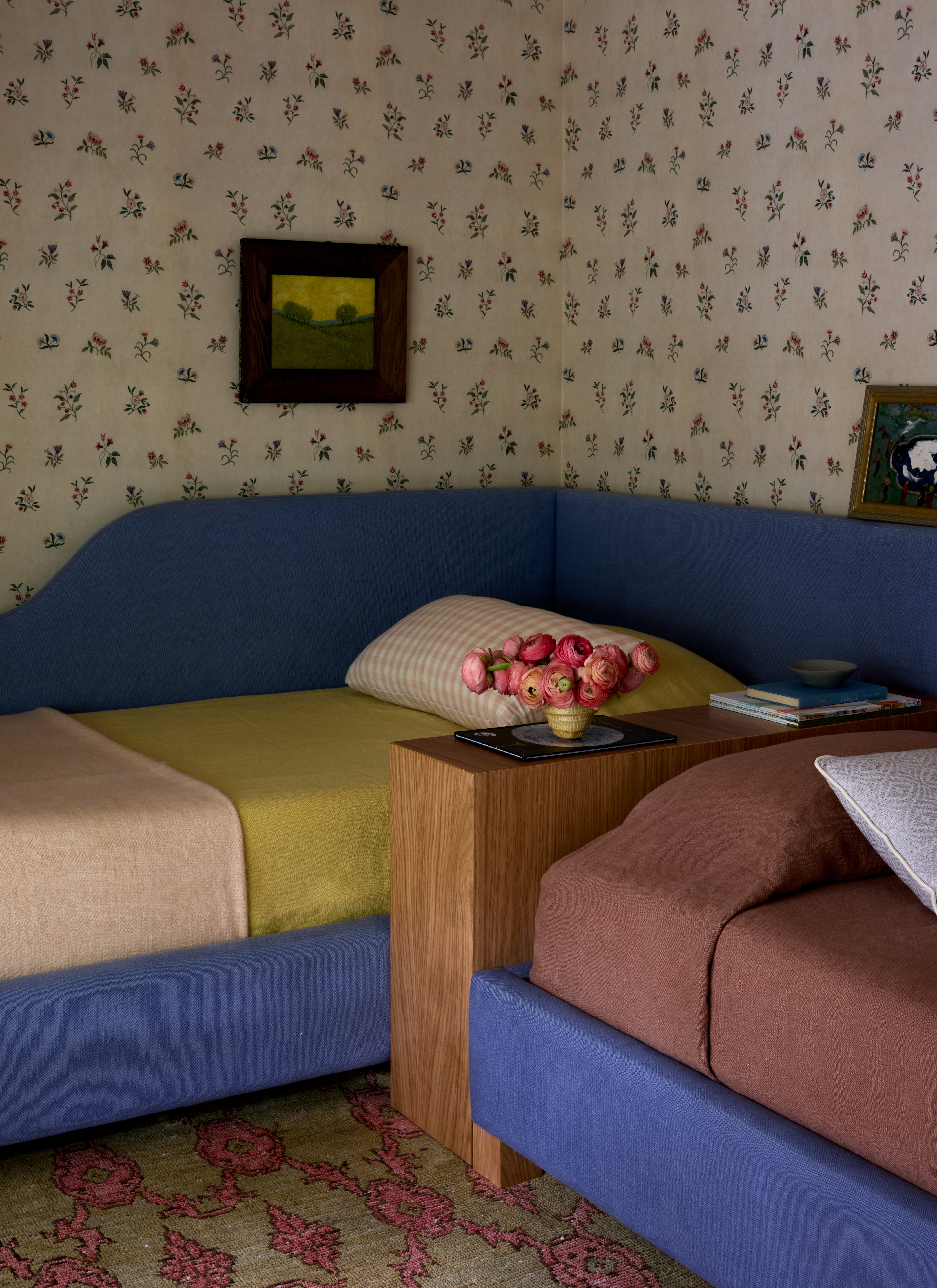 blue, chartreuse, and peach color-blocked bed