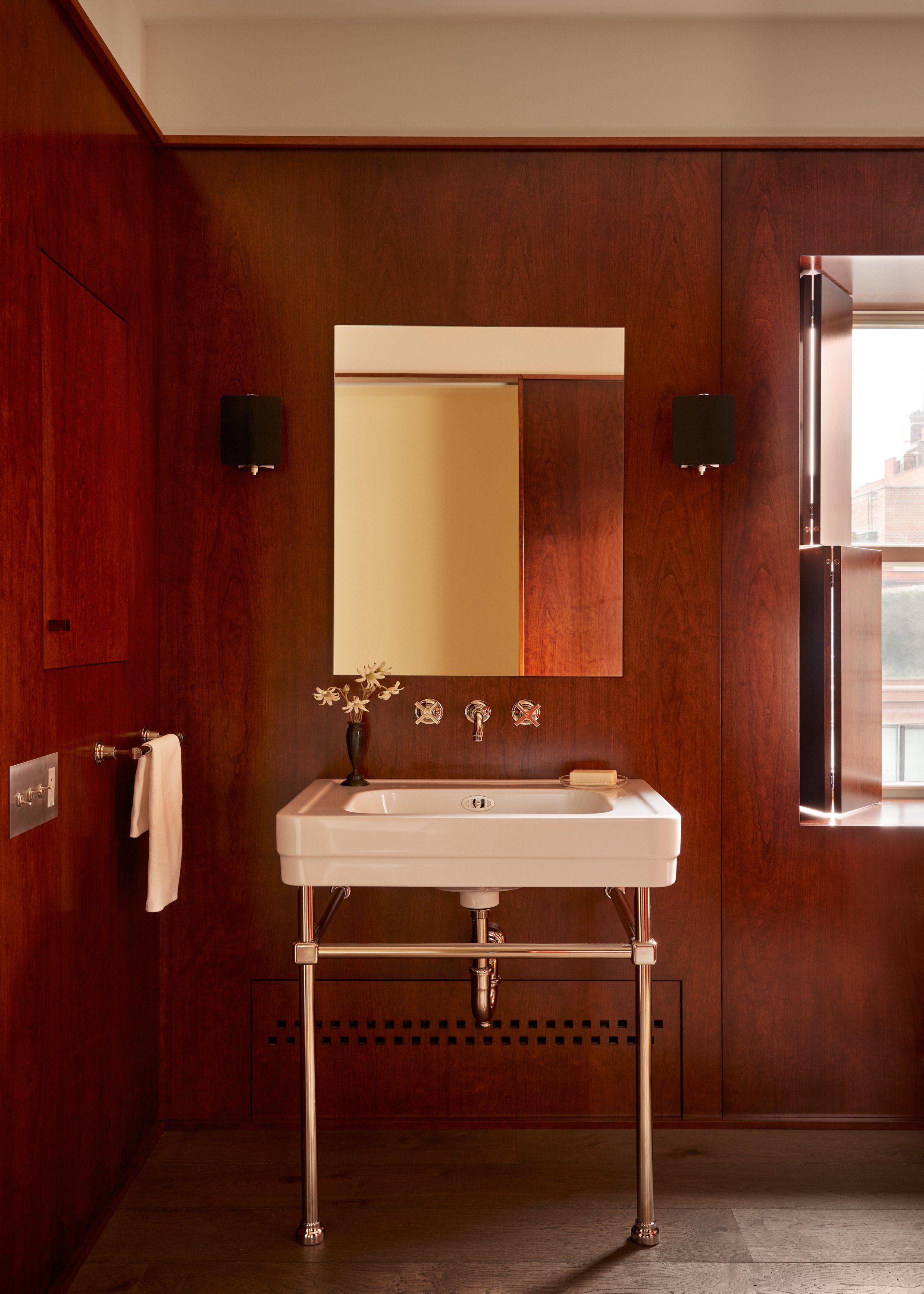 cherry wood–paneled bathroom