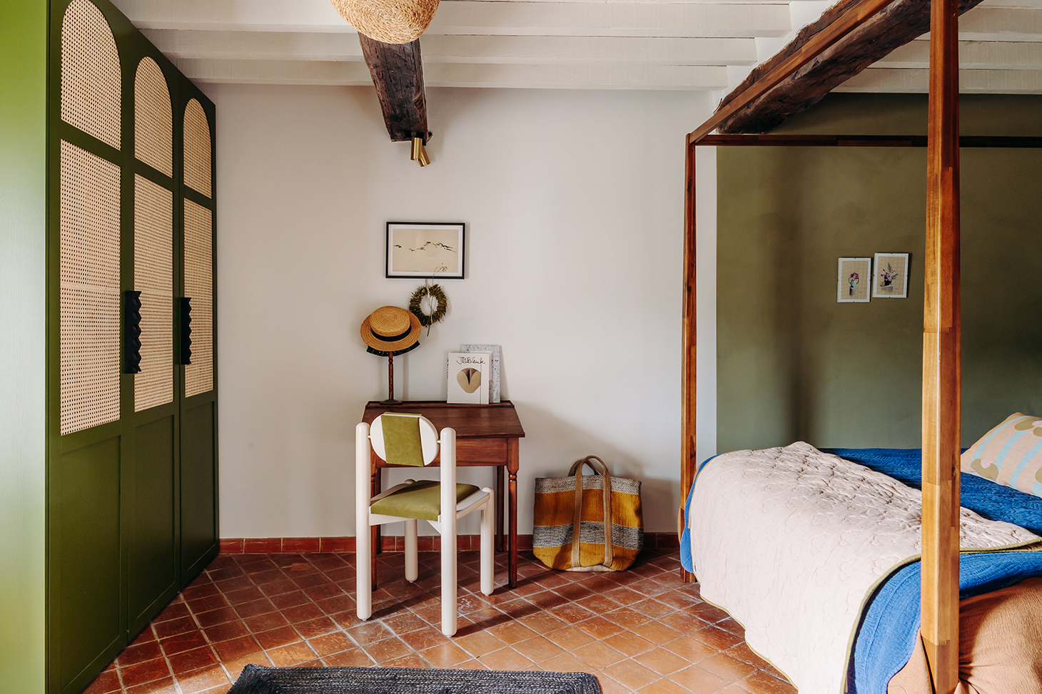 bedroom with green cabinet