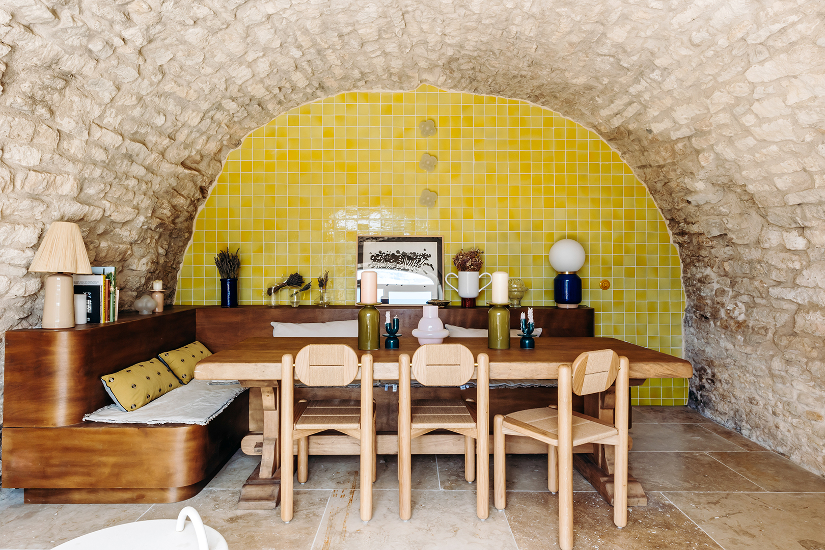arched dining room with yellow tile