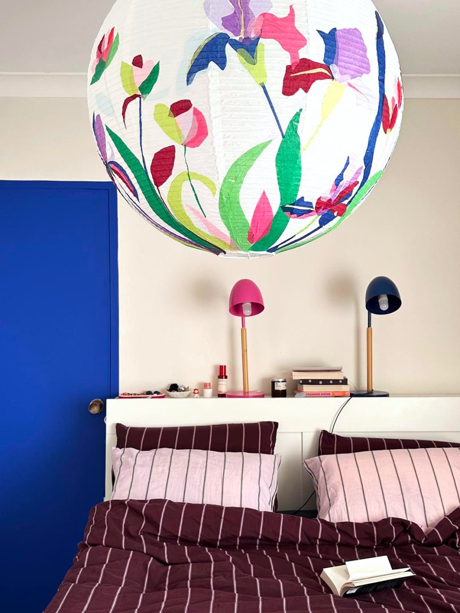 colorful lantern above a bed