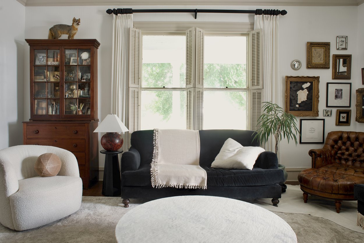 living room with blue sofa