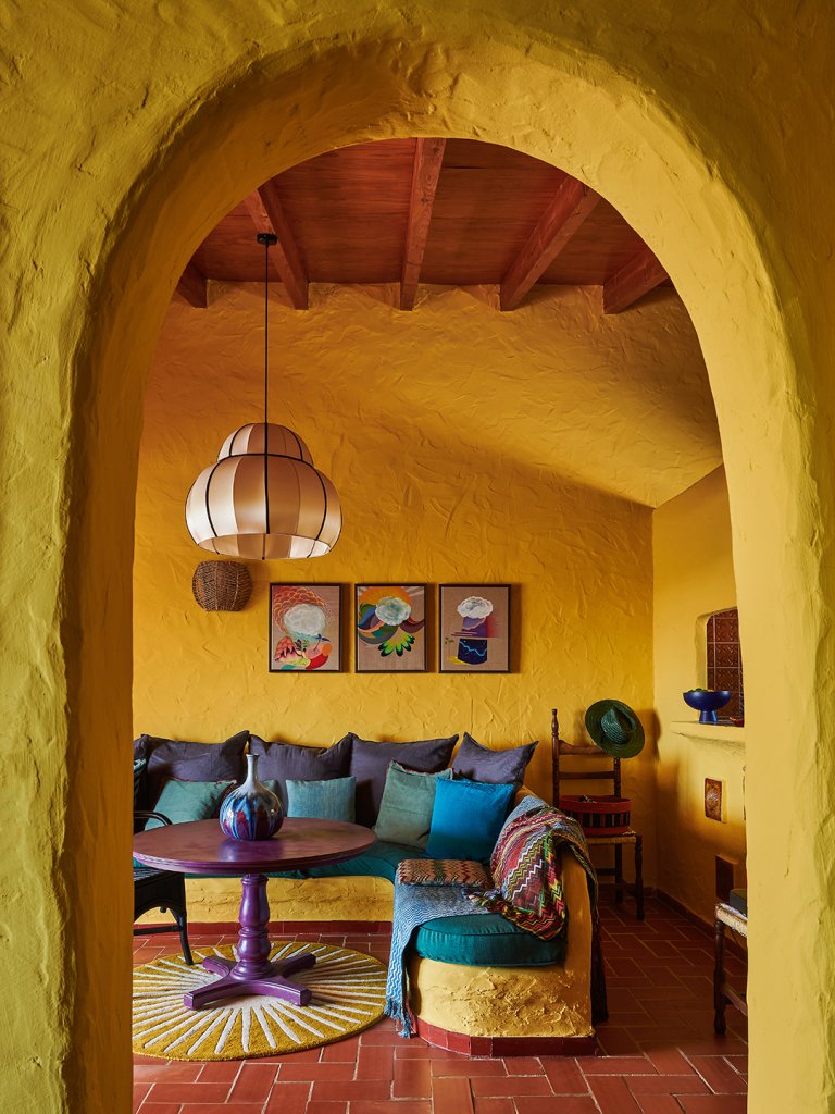 yellow room with arched opening