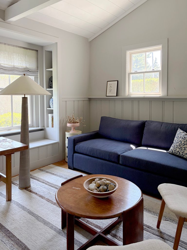 blue sleeper sofa in a living room