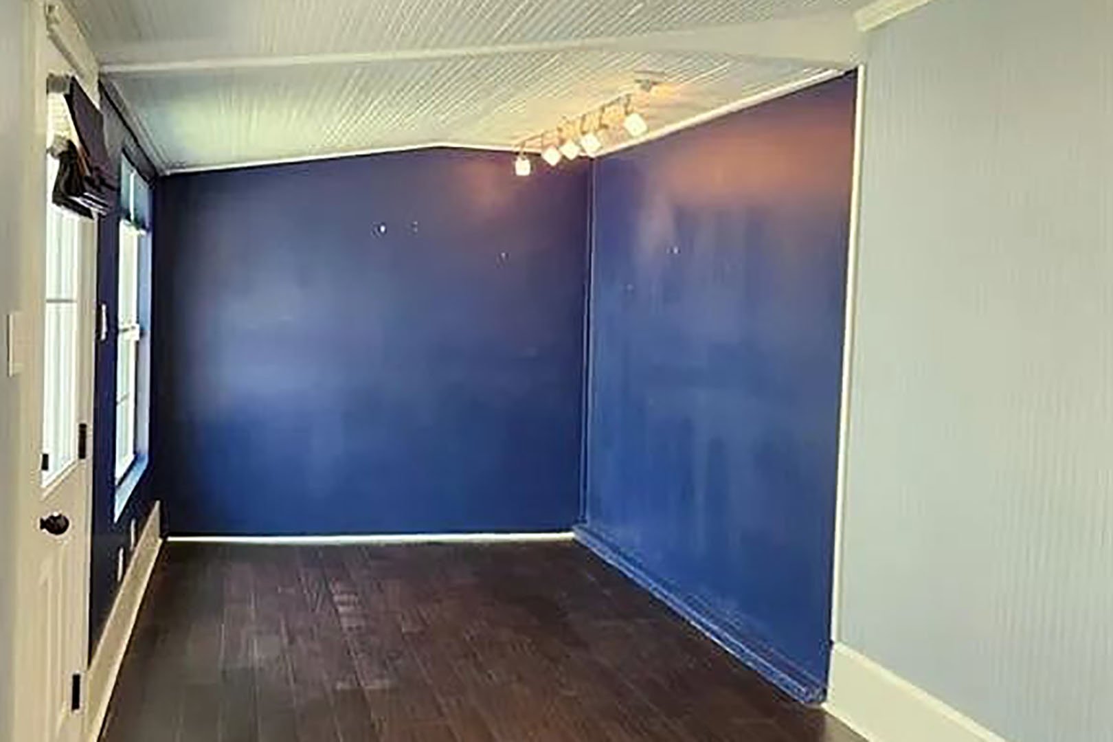 blue walled pool house pre-renovation