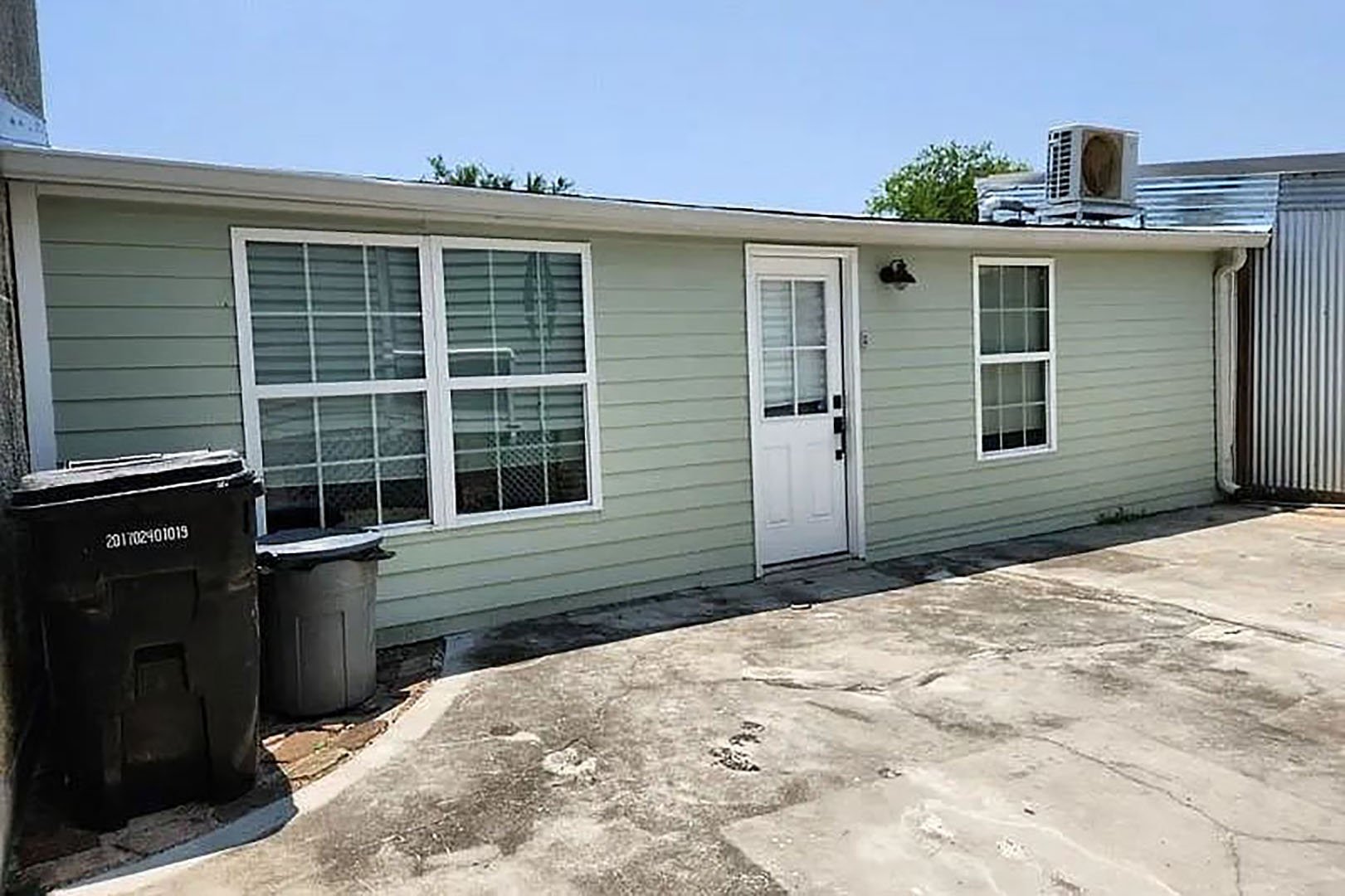 pool house exterior pre-renovation