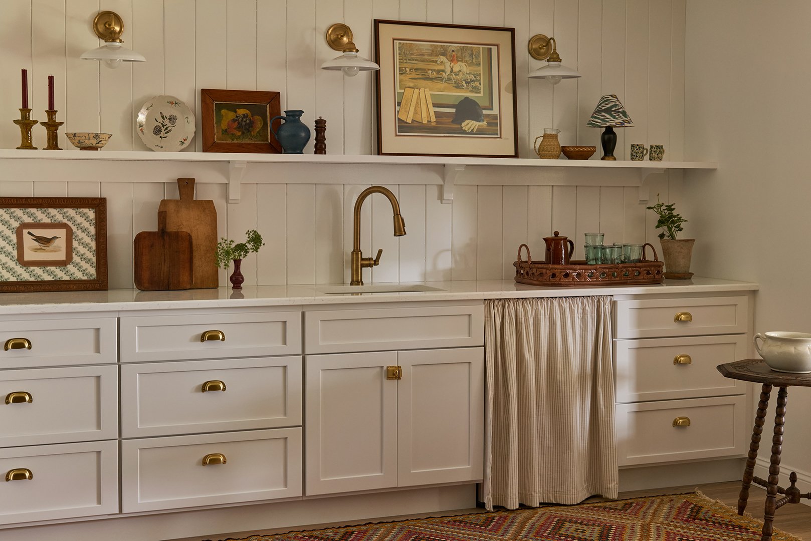 white paneled kitchenette