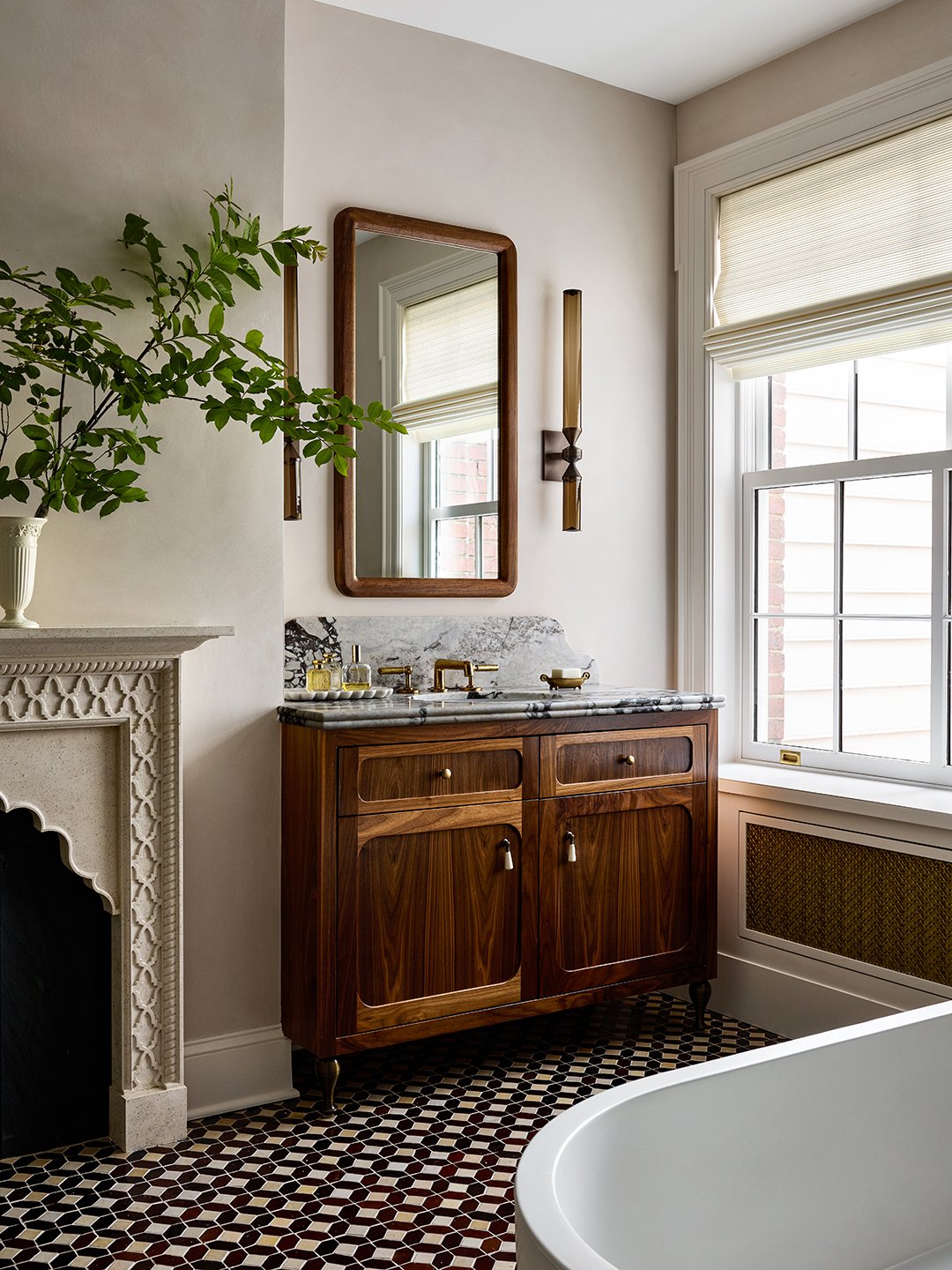 ensuite with wood vanity and marble top