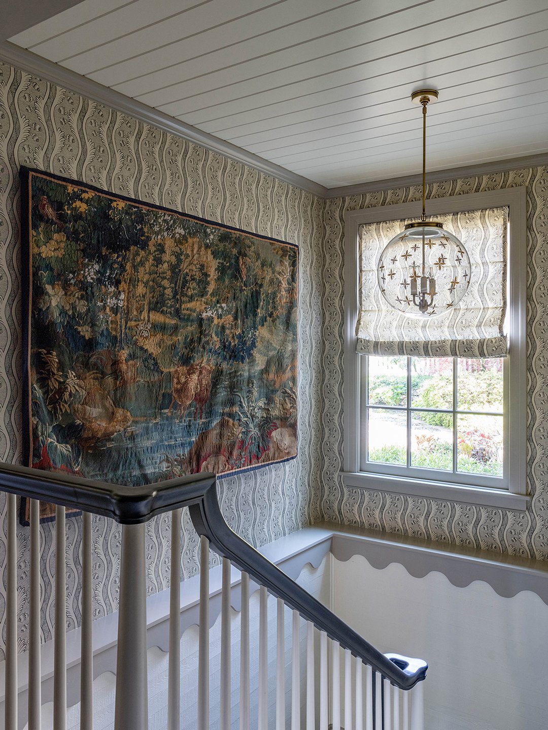 gray wallpapered stairwell