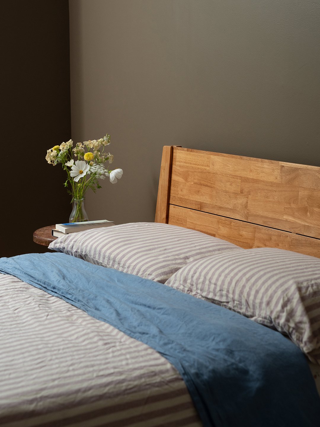 bed with striped bedding