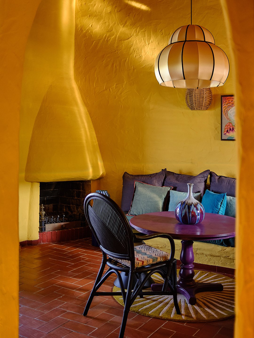 yellow living room with plaster hearth