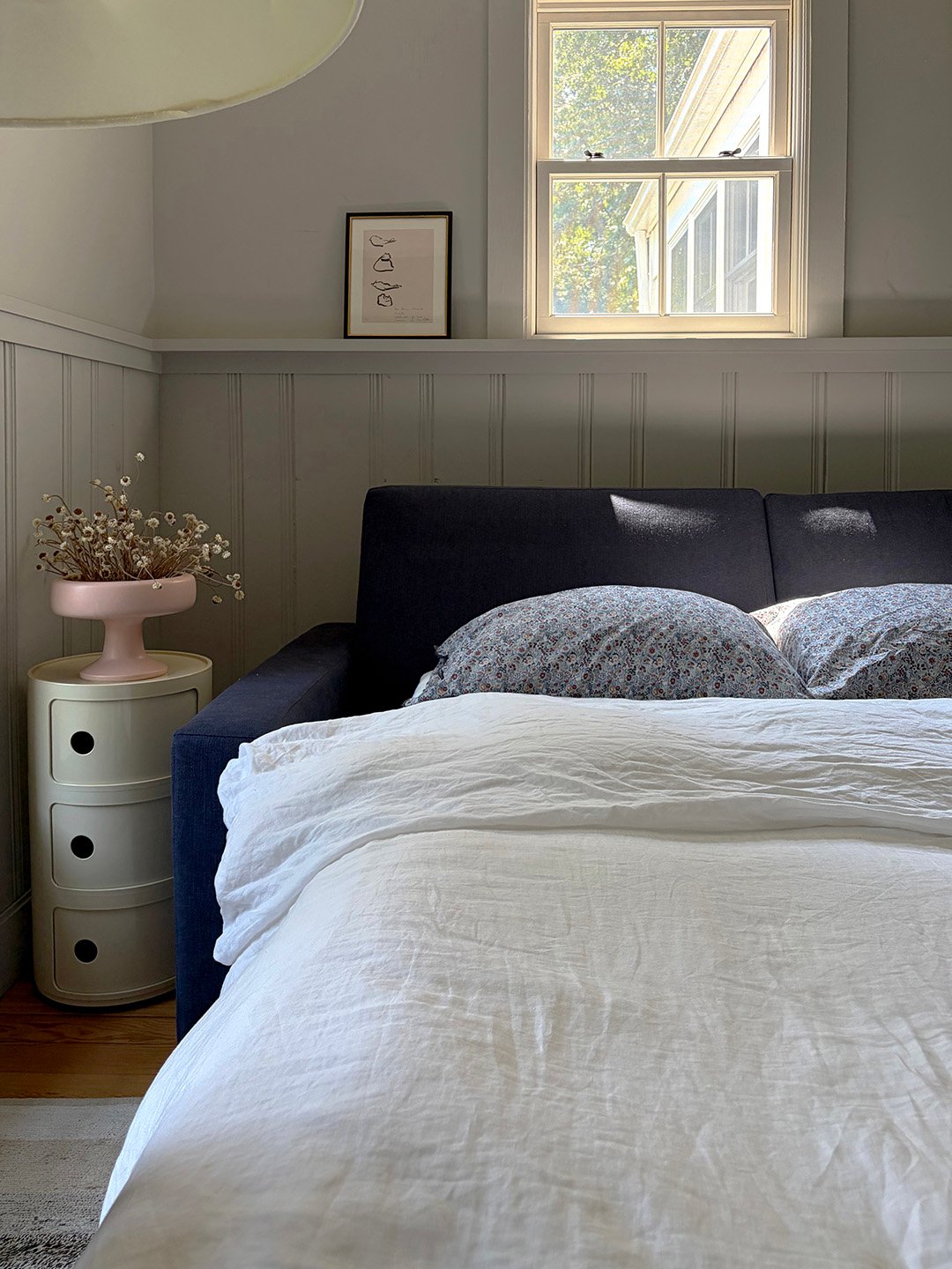 blue sofa in a gray room