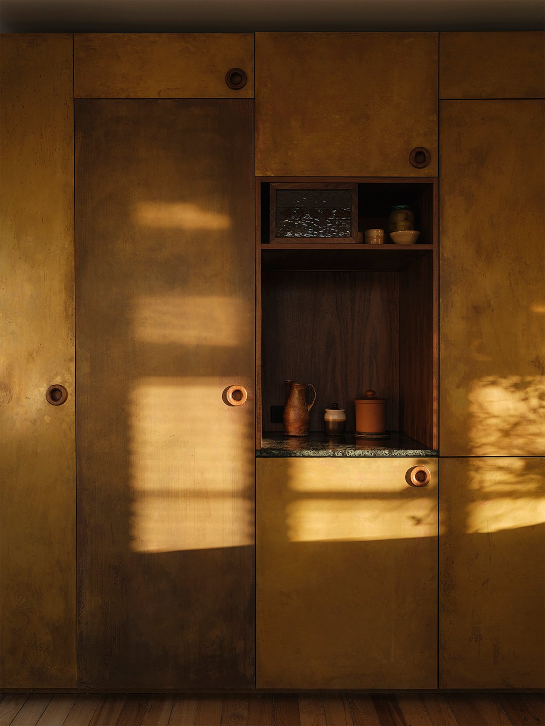 wall of brass cabinets