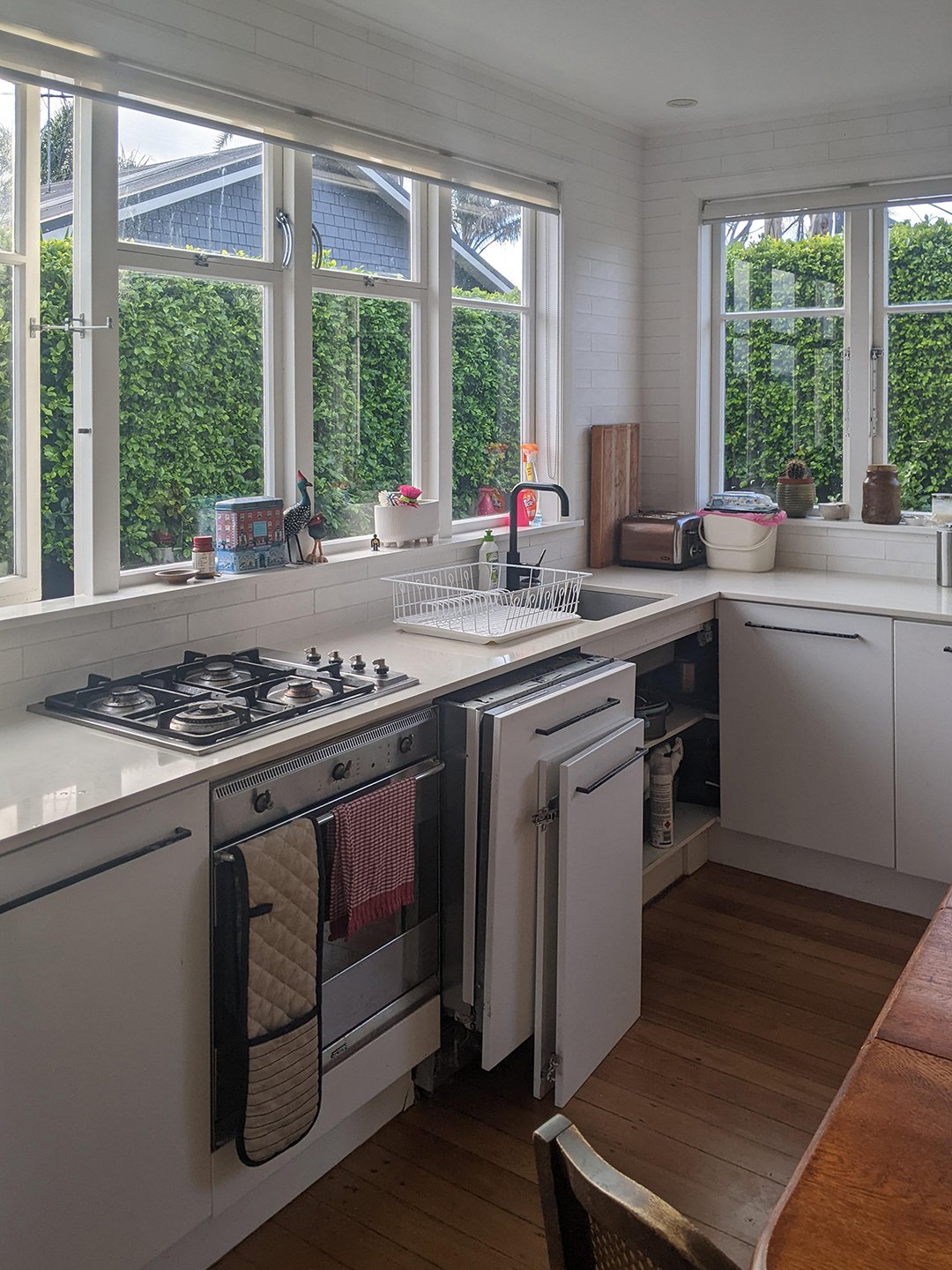 white kitchen with windows