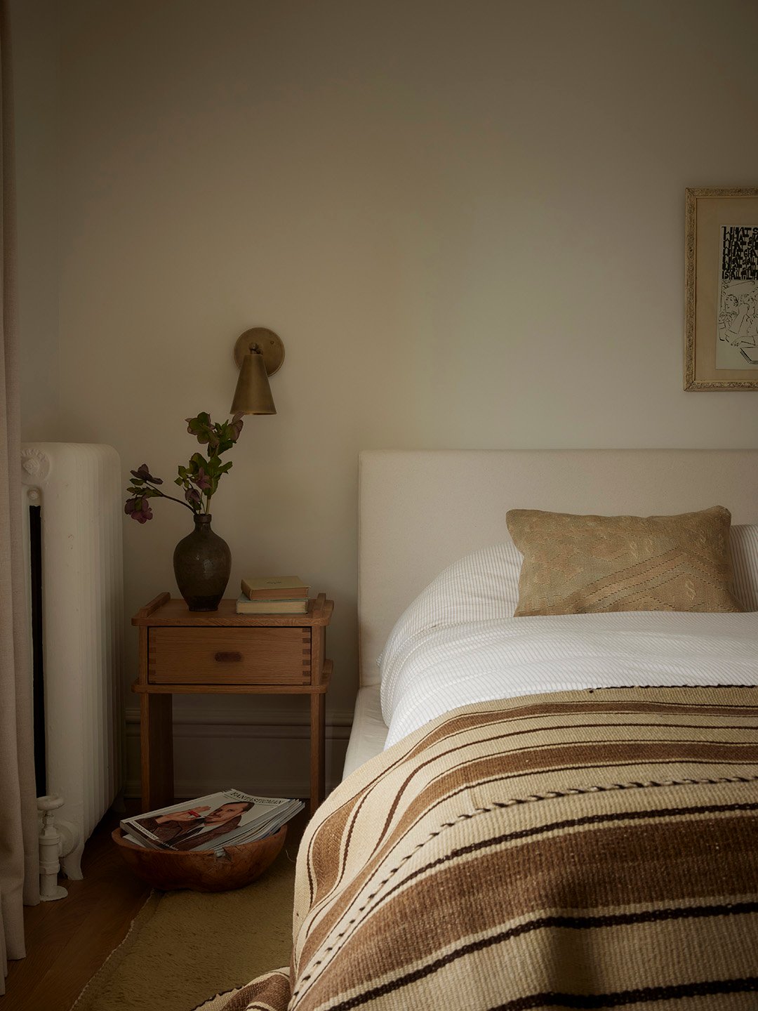 bed with brown quilt