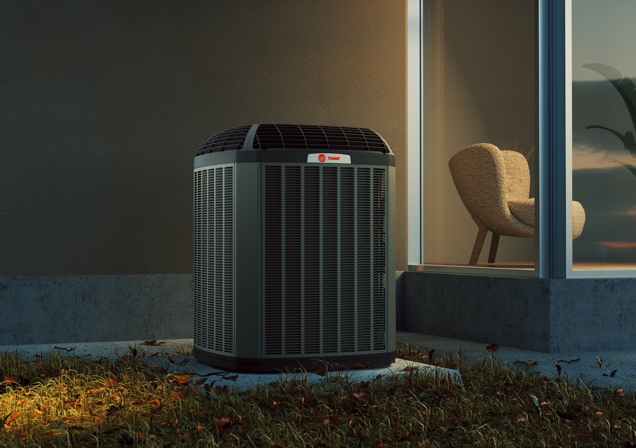 Heat pump outside home at night. 